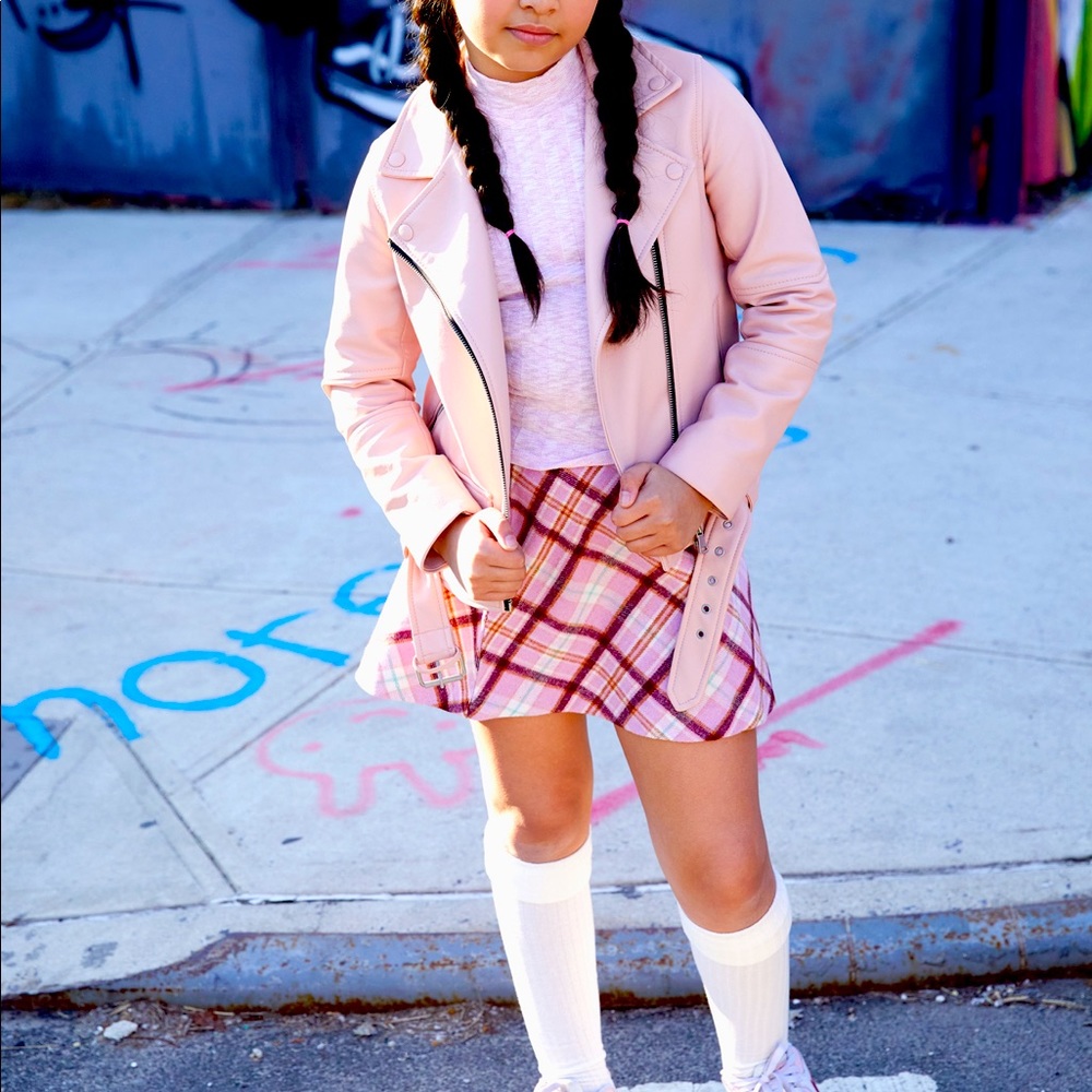 Super cute pink biker jacket. A showstopper. Great with skirts!